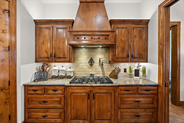 a kitchen with a sink and a window