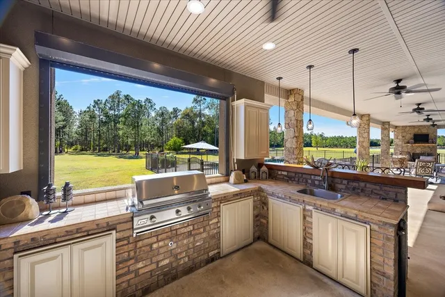 a living room with furniture gym equipment and a flat screen tv