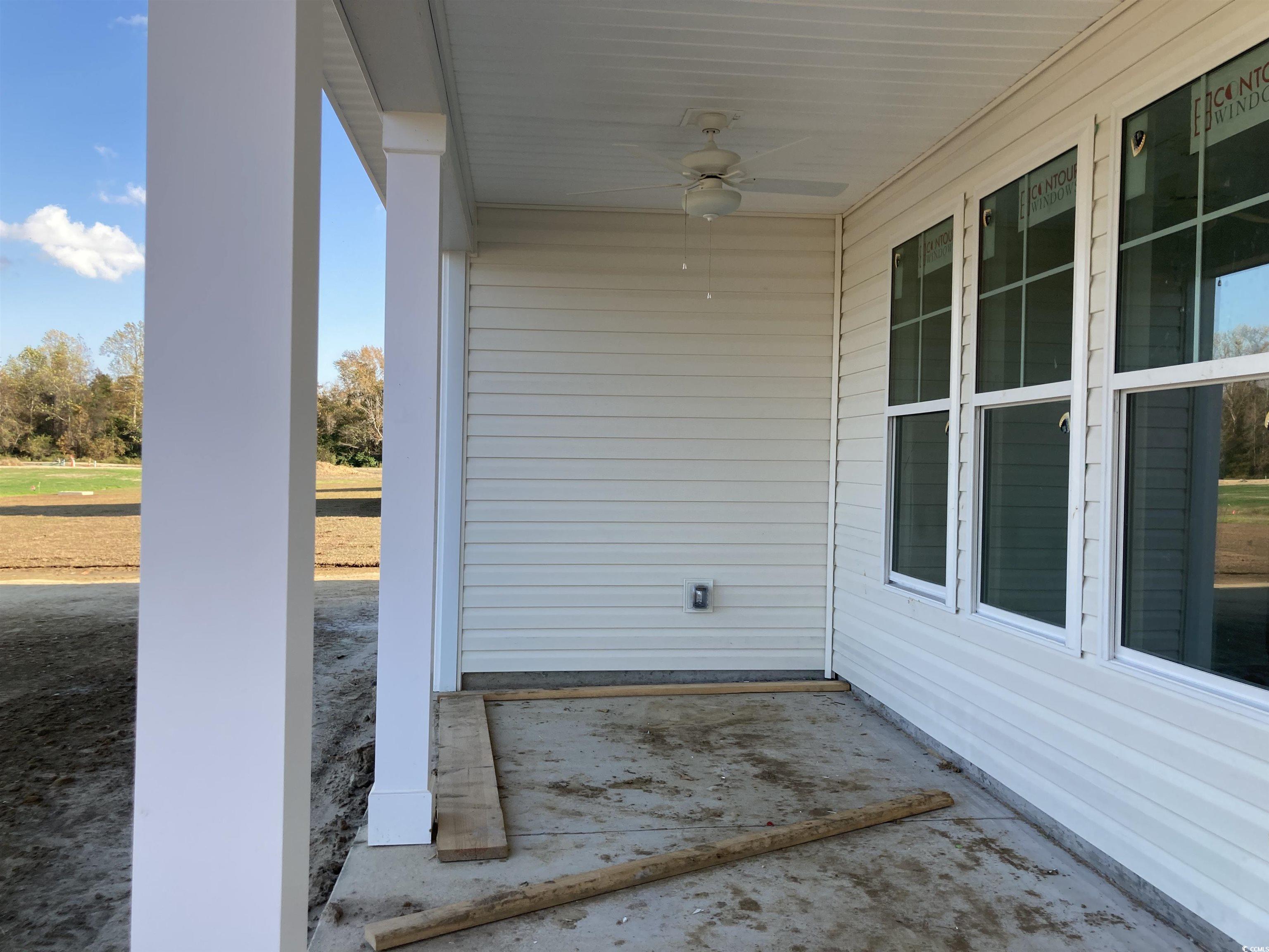 146 River Birch Drive Loris, SC 29569 - Photo 18 of 21 View of patio with ceiling fan