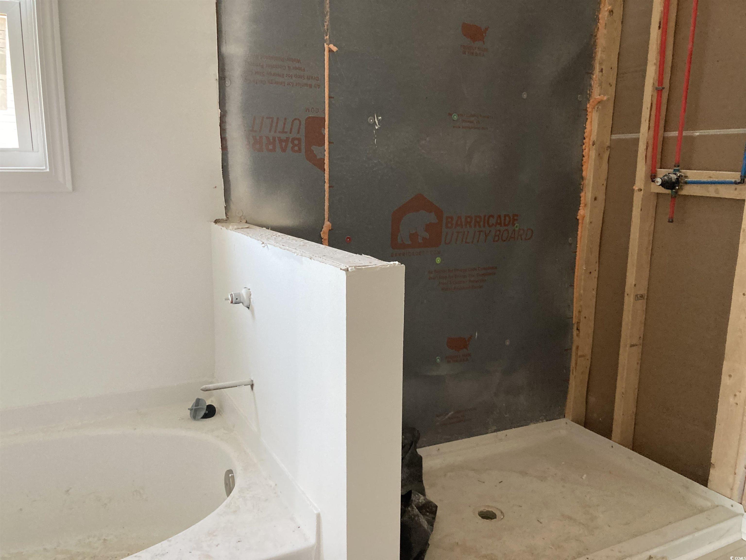 146 River Birch Drive Loris, SC 29569 - Photo 6 of 21 Full bathroom with a bath and a shower stall