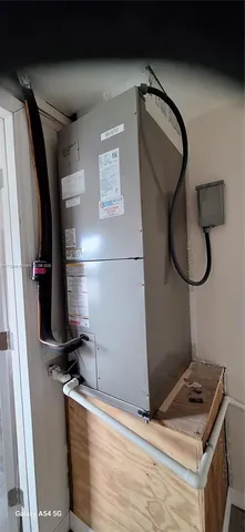 a room with gym equipment and a mirror