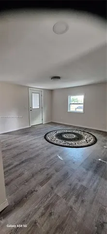 a view of a room with a sink and a window