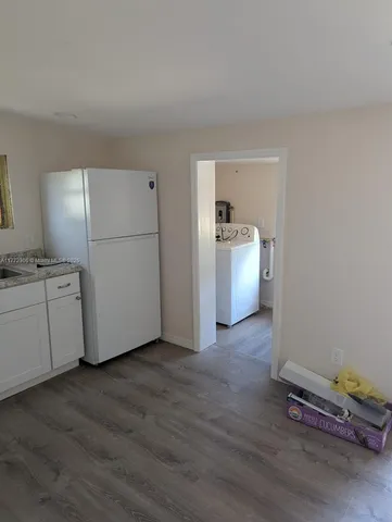 a view of utility room and washer and dryer