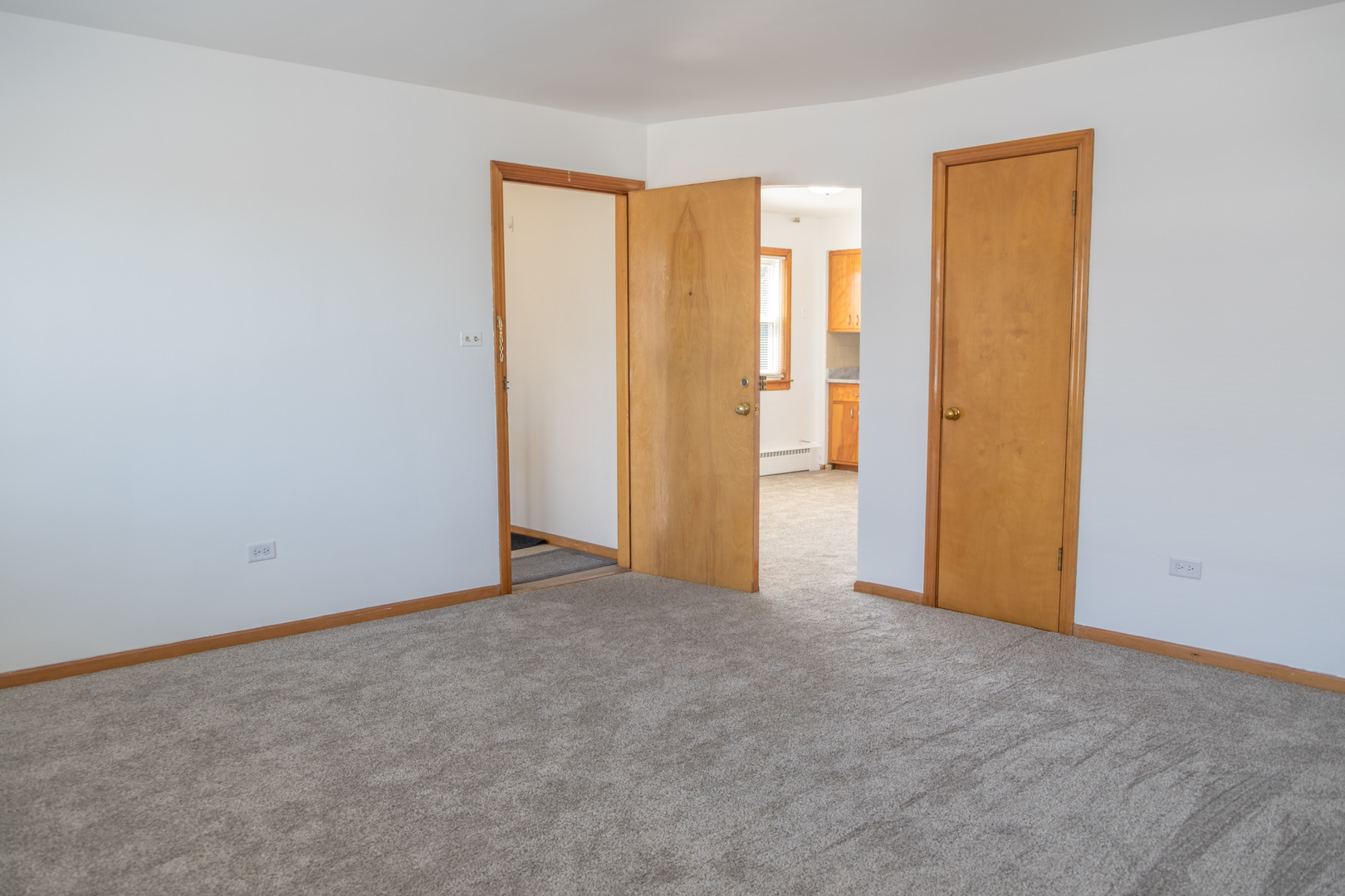 5520 South Pulaski Road, Unit 2 Chicago, IL 60629 - Photo 11 of 44 an empty room with windows