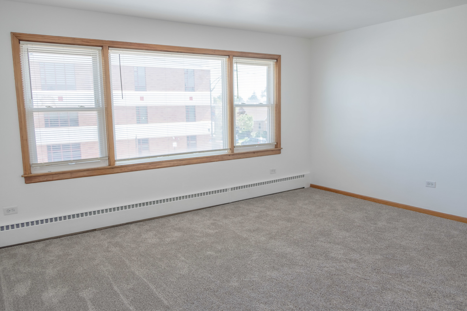 5520 South Pulaski Road, Unit 2 Chicago, IL 60629 - Photo 14 of 44 an empty room with a window