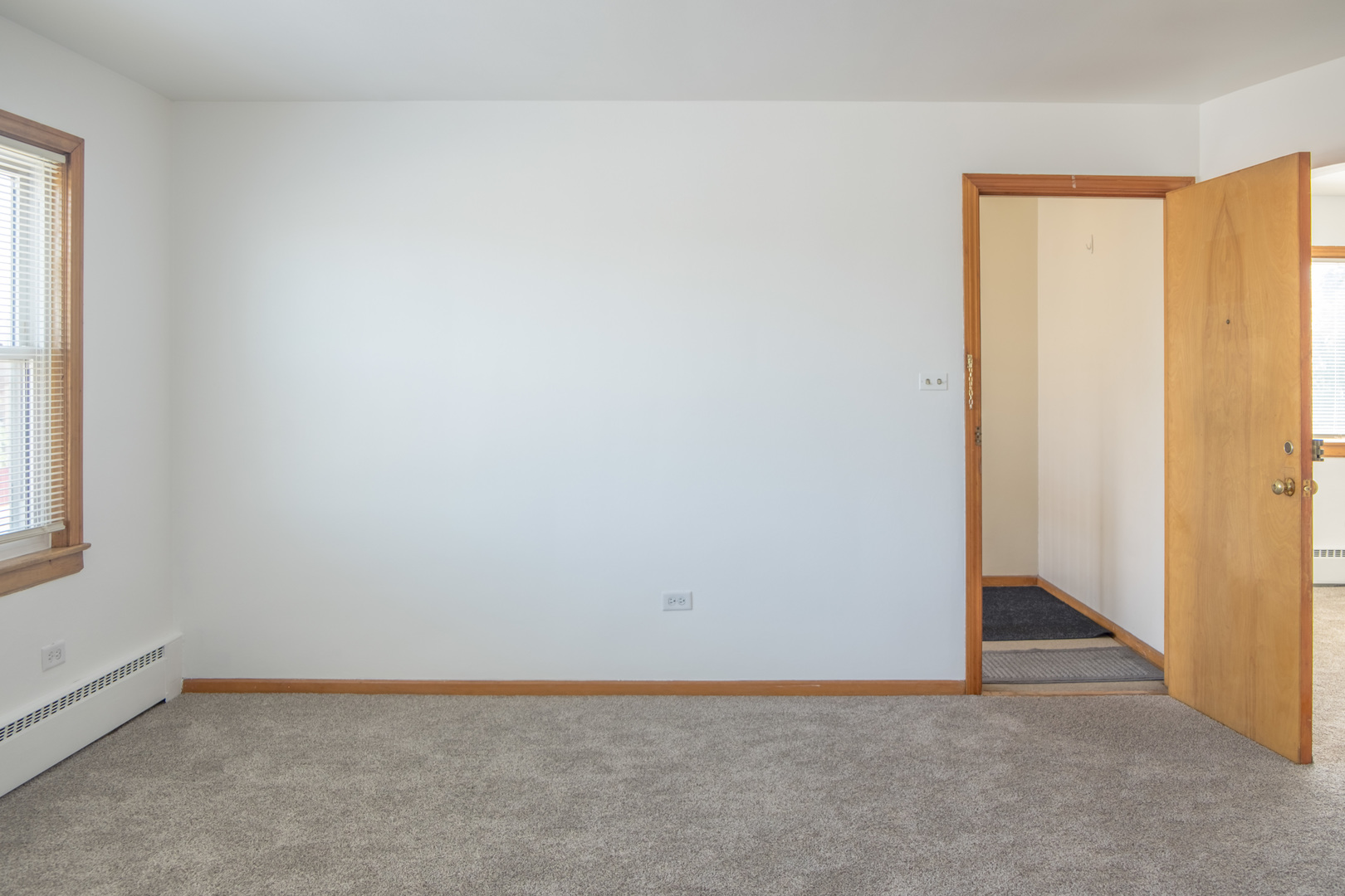 5520 South Pulaski Road, Unit 2 Chicago, IL 60629 - Photo 15 of 44 an empty room with windows