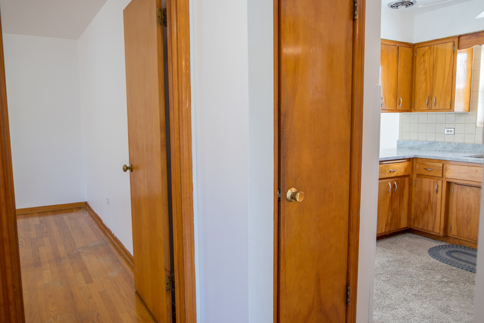 5520 South Pulaski Road, Unit 2 Chicago, IL 60629 - Photo 19 of 44 a view of a kitchen from the hallway