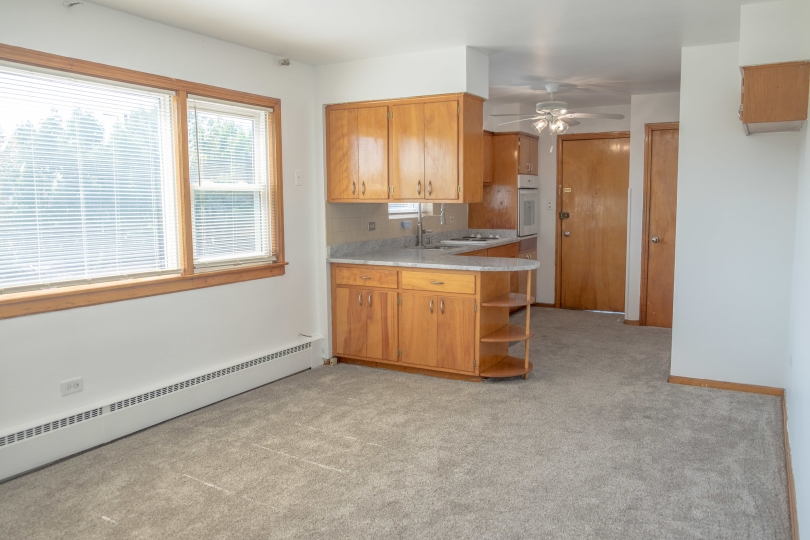 5520 South Pulaski Road, Unit 2 Chicago, IL 60629 - Photo 2 of 44 a bathroom with a double vanity sink and a bathtub