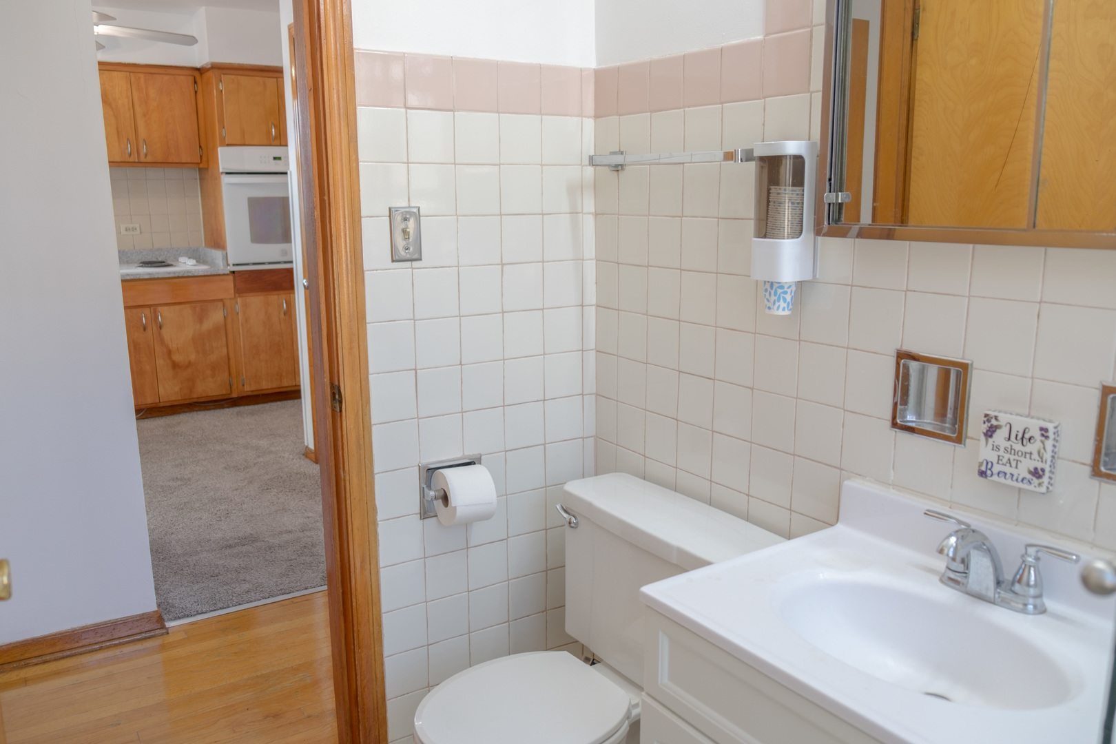 5520 South Pulaski Road, Unit 2 Chicago, IL 60629 - Photo 26 of 44 a bathroom with a sink a toilet and shower