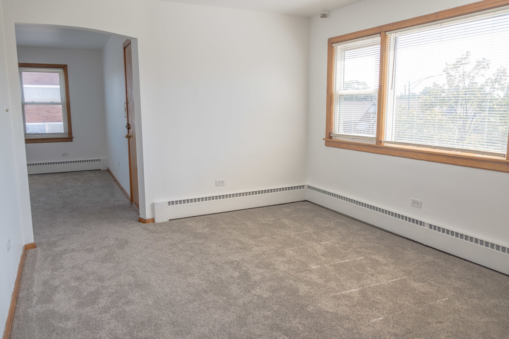 5520 South Pulaski Road, Unit 2 Chicago, IL 60629 - Photo 10 of 44 an empty room with a window