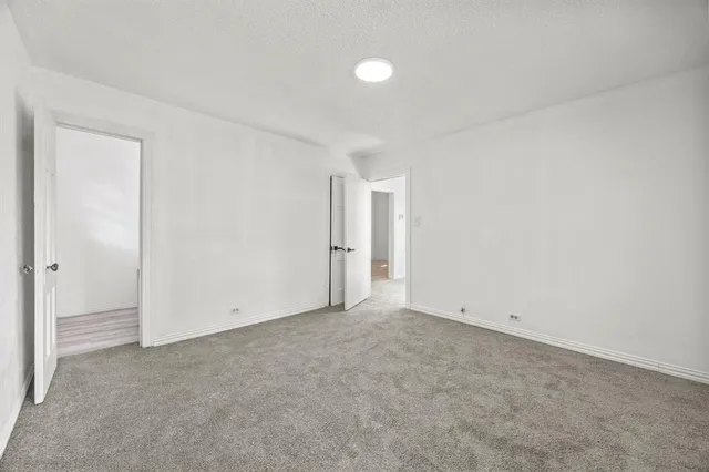 an empty room with an entryway