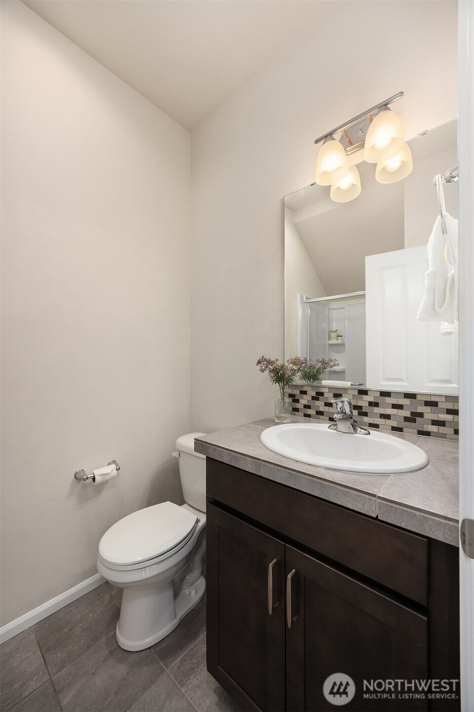 17604 Quartz Street Granite Falls, WA 98252 - Photo 14 of 40 a bathroom with a toilet sink and mirror