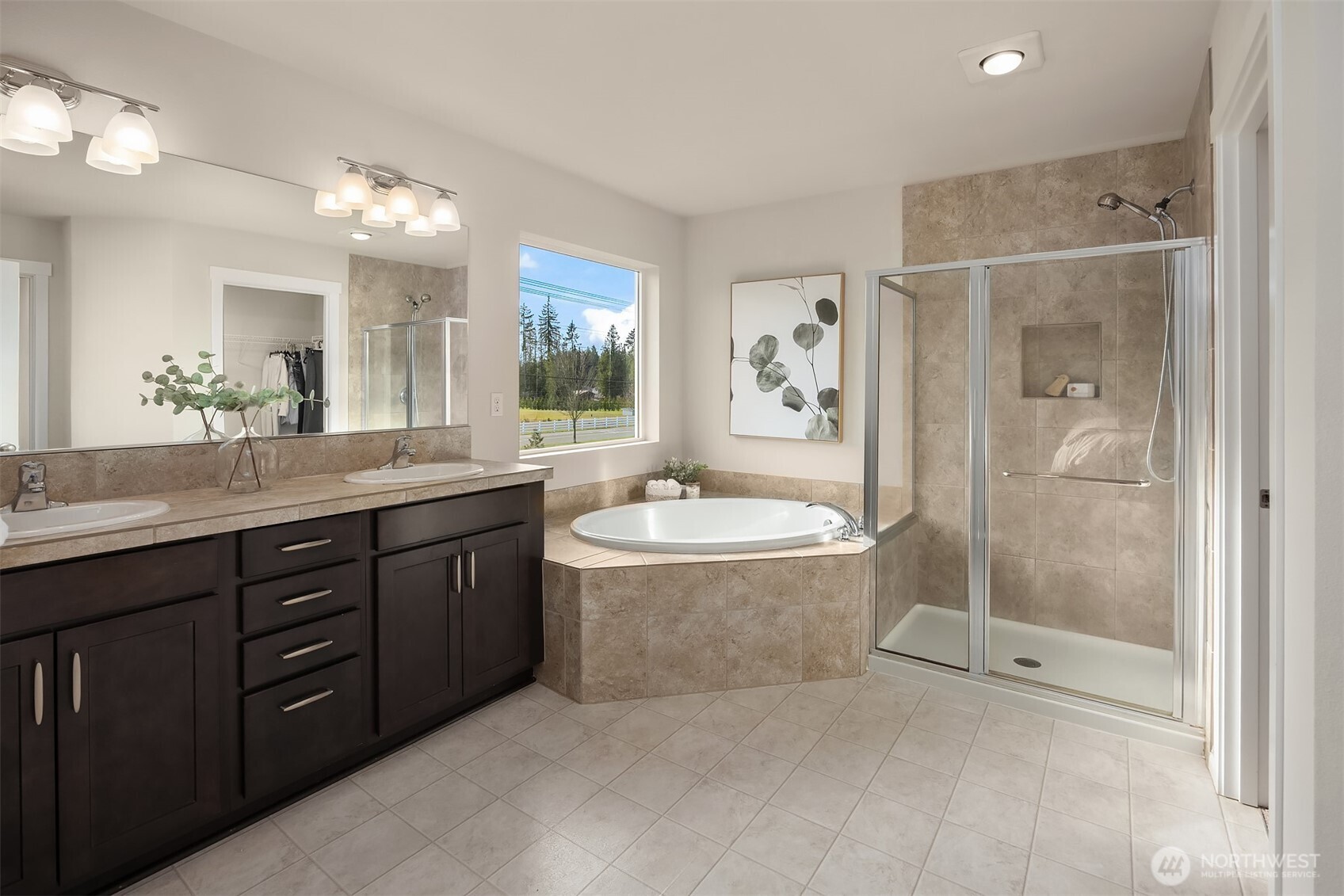 17604 Quartz Street Granite Falls, WA 98252 - Photo 19 of 40 a bathroom with a tub a sink shower and mirror
