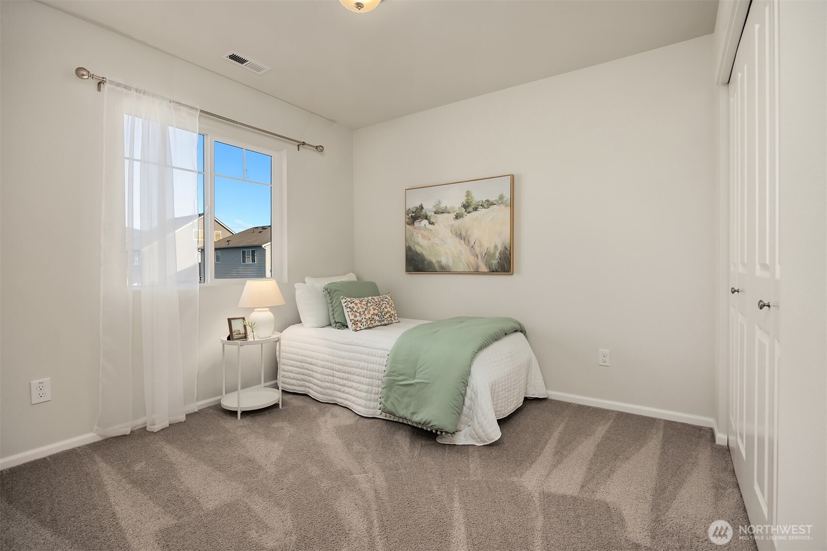 17604 Quartz Street Granite Falls, WA 98252 - Photo 23 of 40 a bedroom with a bed and a painting