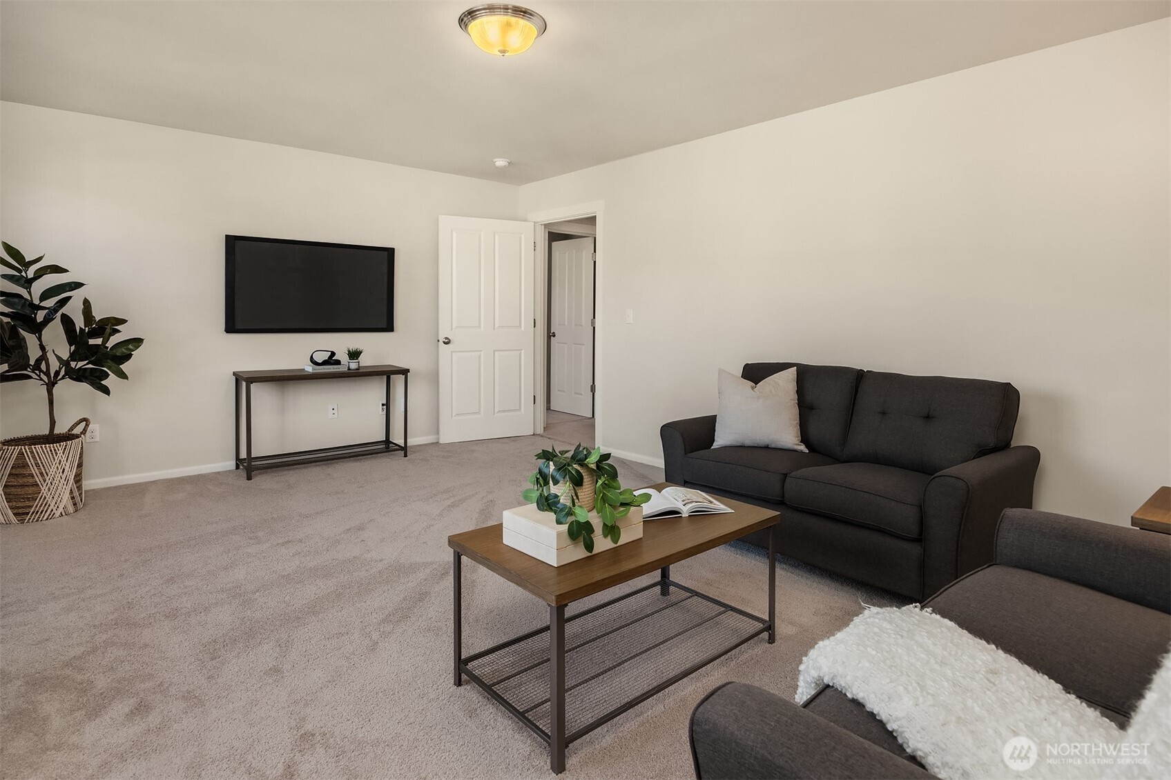17604 Quartz Street Granite Falls, WA 98252 - Photo 25 of 40 a living room with furniture and a flat screen tv