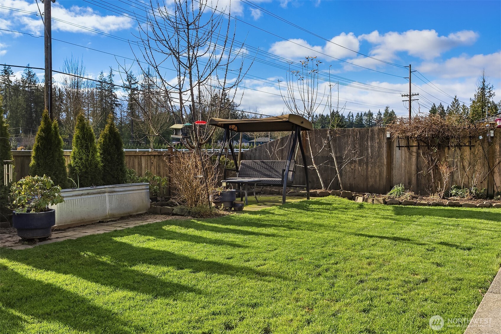 17604 Quartz Street Granite Falls, WA 98252 - Photo 30 of 40 a view of a chair and tables in the backyard