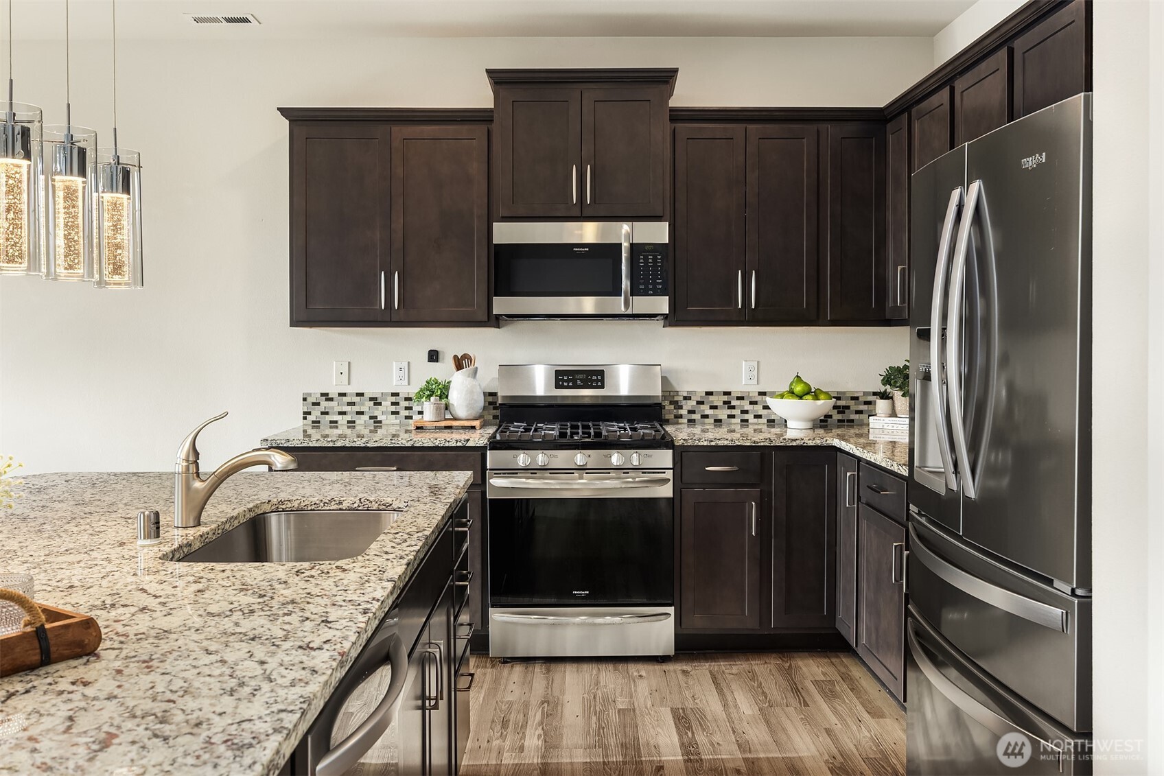 17604 Quartz Street Granite Falls, WA 98252 - Photo 8 of 40 a kitchen with a sink stove and refrigerator
