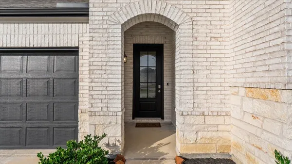 a front view of a house with a window