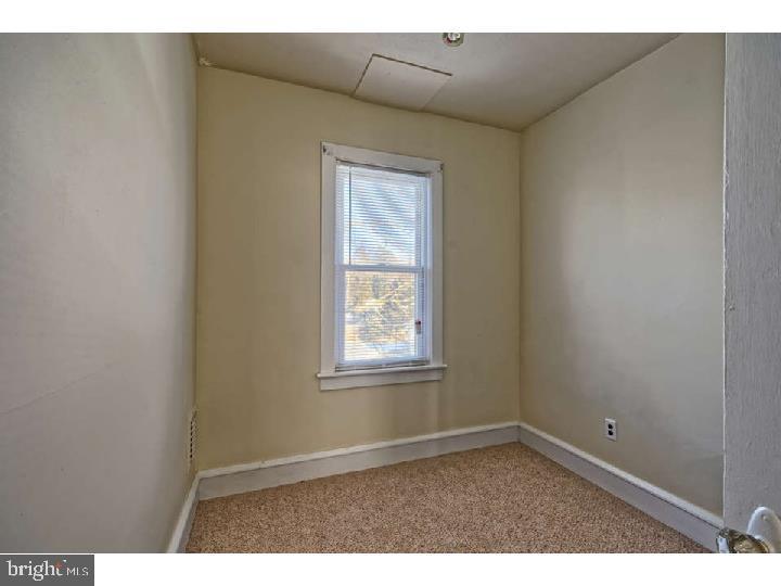 407 North Broadway Pitman, NJ 08071 - Photo 13 of 20 a view of an empty room with a window