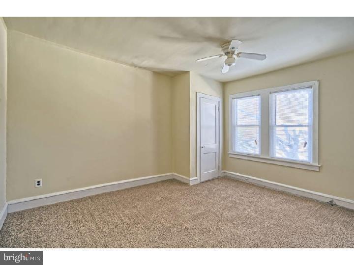 407 North Broadway Pitman, NJ 08071 - Photo 14 of 20 a view of an empty room with a window