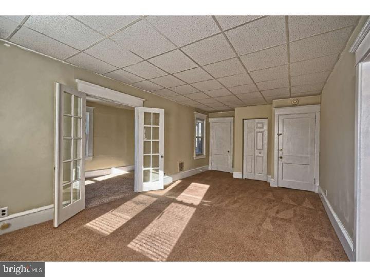 407 North Broadway Pitman, NJ 08071 - Photo 16 of 20 a view of an empty room and window