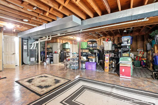 a view of a studio with wooden floor