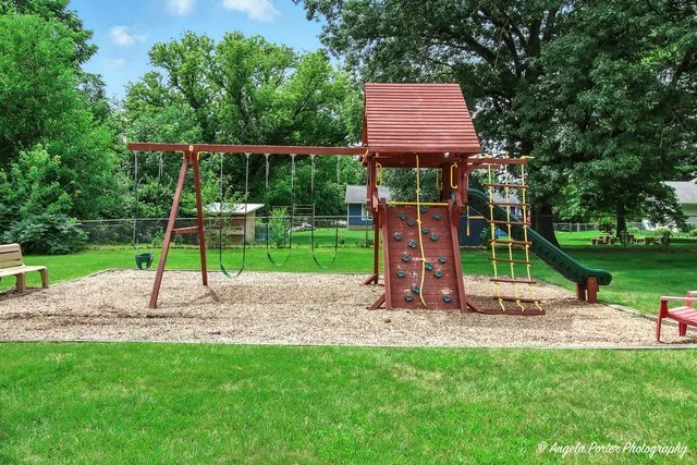 a view of a park with a slide
