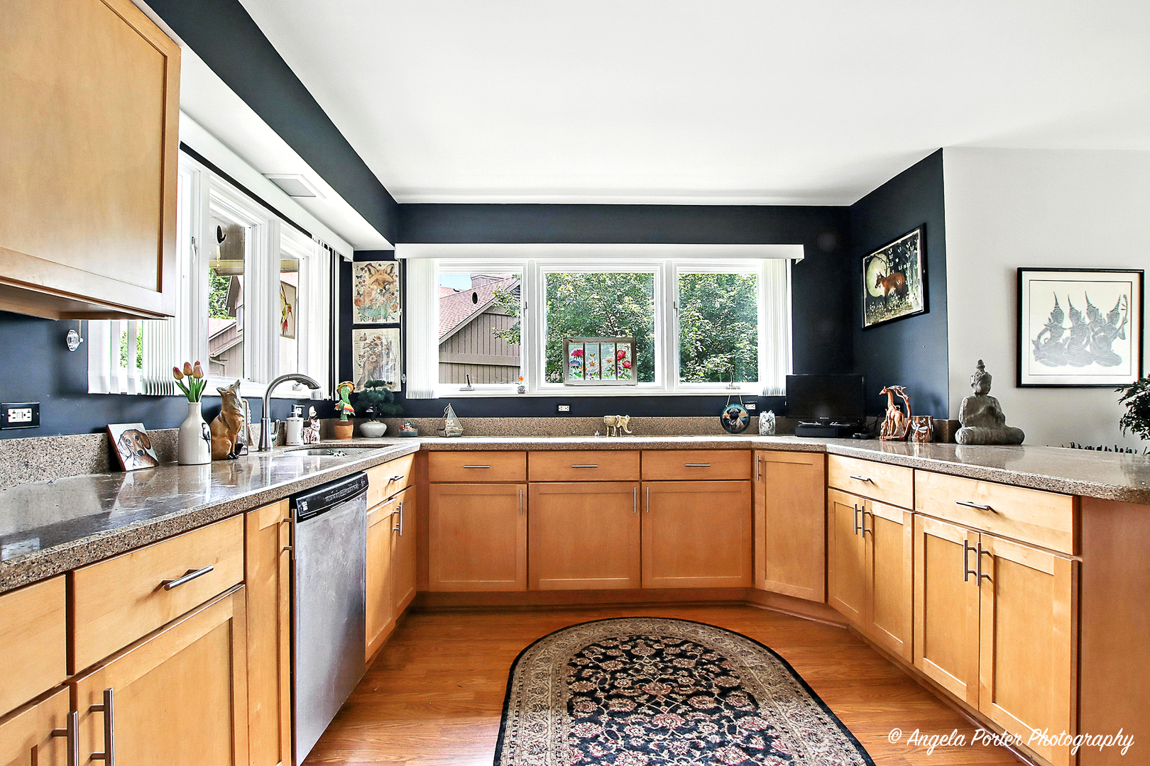 4119 White Ash Road Crystal Lake, IL 60014 - Photo 5 of 48 a kitchen with stainless steel appliances granite countertop a sink stove and cabinets