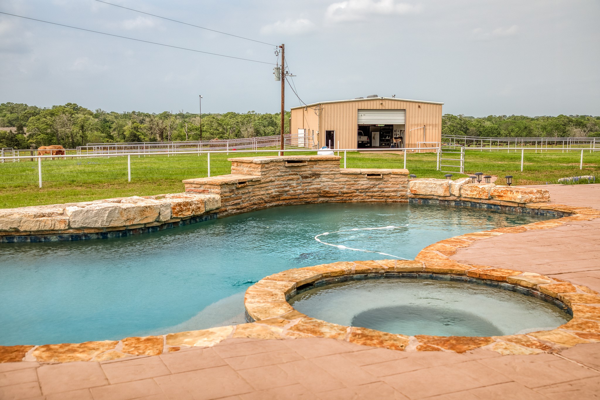 2204 Carter Road Bellville, TX 77418 - Photo 3 of 30 an aerial view of a house with a lake view