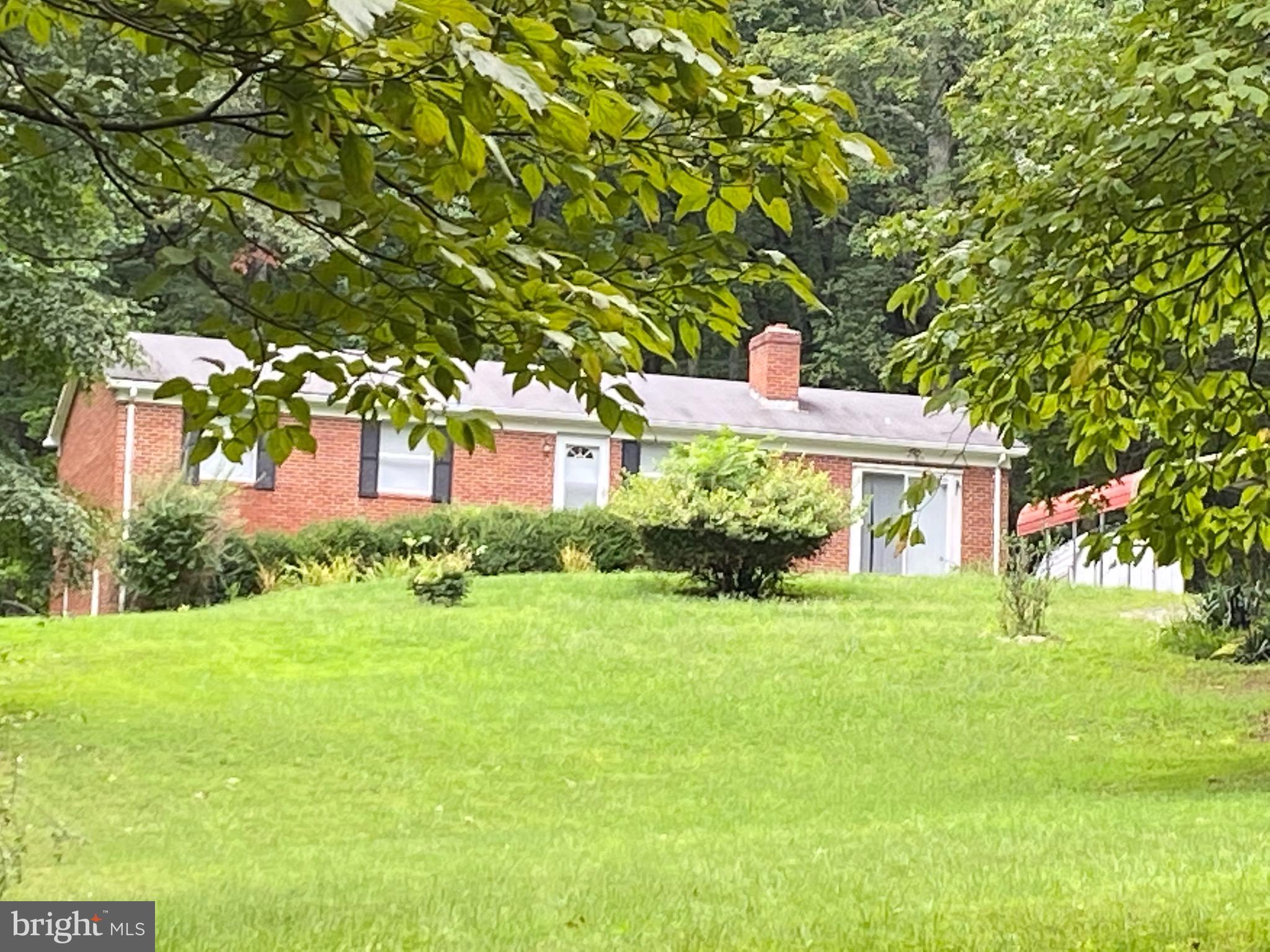 41 Comptons Road Castleton, VA 22716 - Photo 1 of 35 Solid brick rambler on six acres.