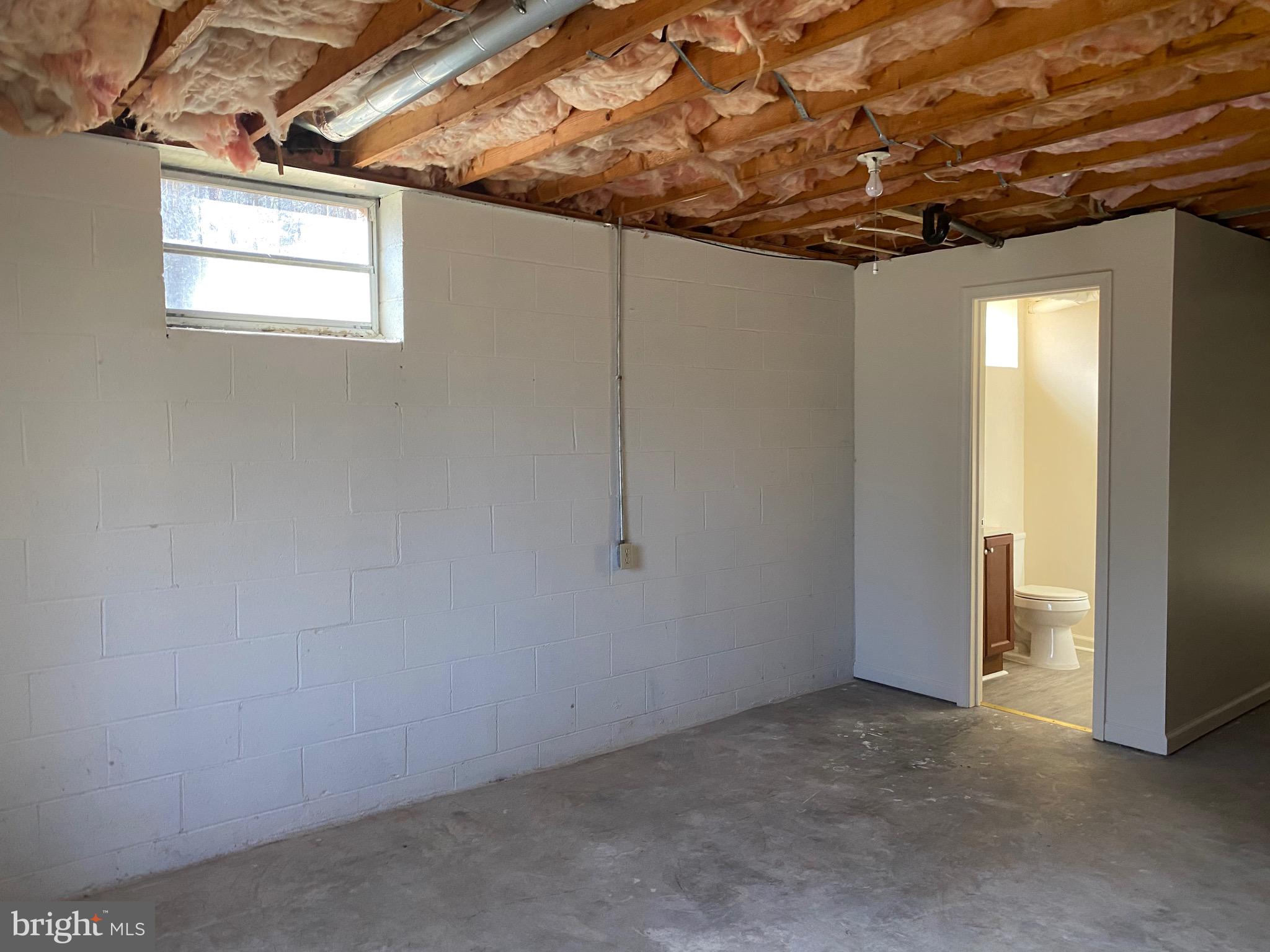 41 Comptons Road Castleton, VA 22716 - Photo 19 of 35 Bath with commode, sink, and shower in lower level