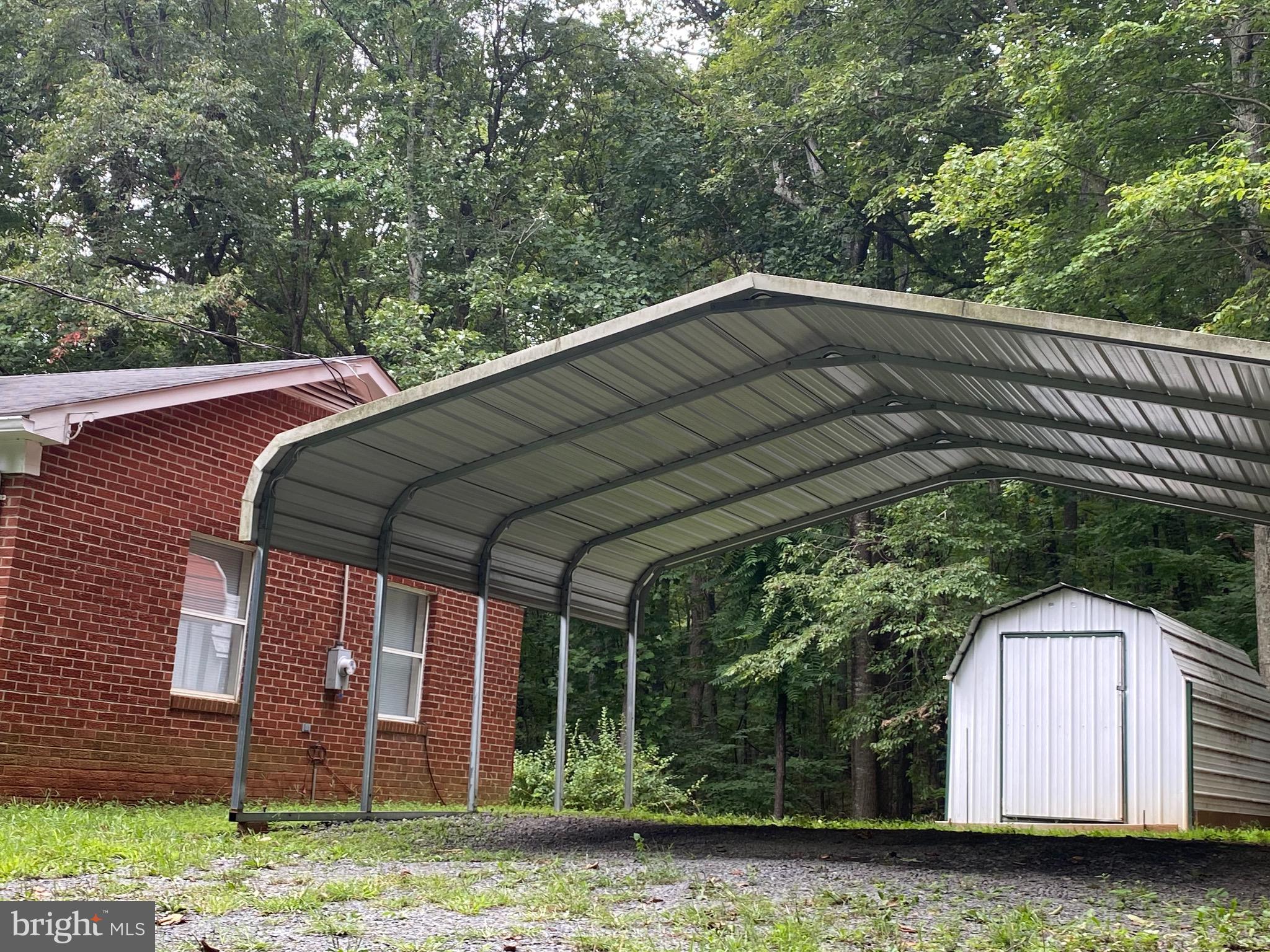 41 Comptons Road Castleton, VA 22716 - Photo 23 of 35 Carport offering covered parking.