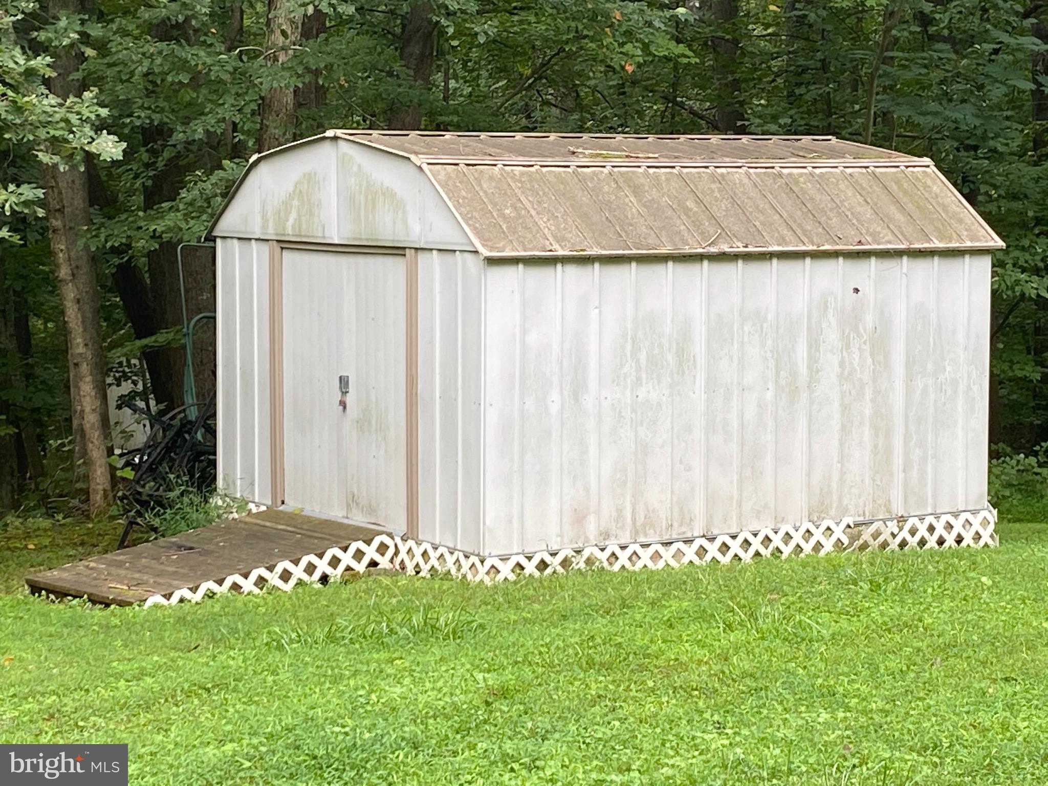 41 Comptons Road Castleton, VA 22716 - Photo 24 of 35 Shed off from basement door/side yard.
