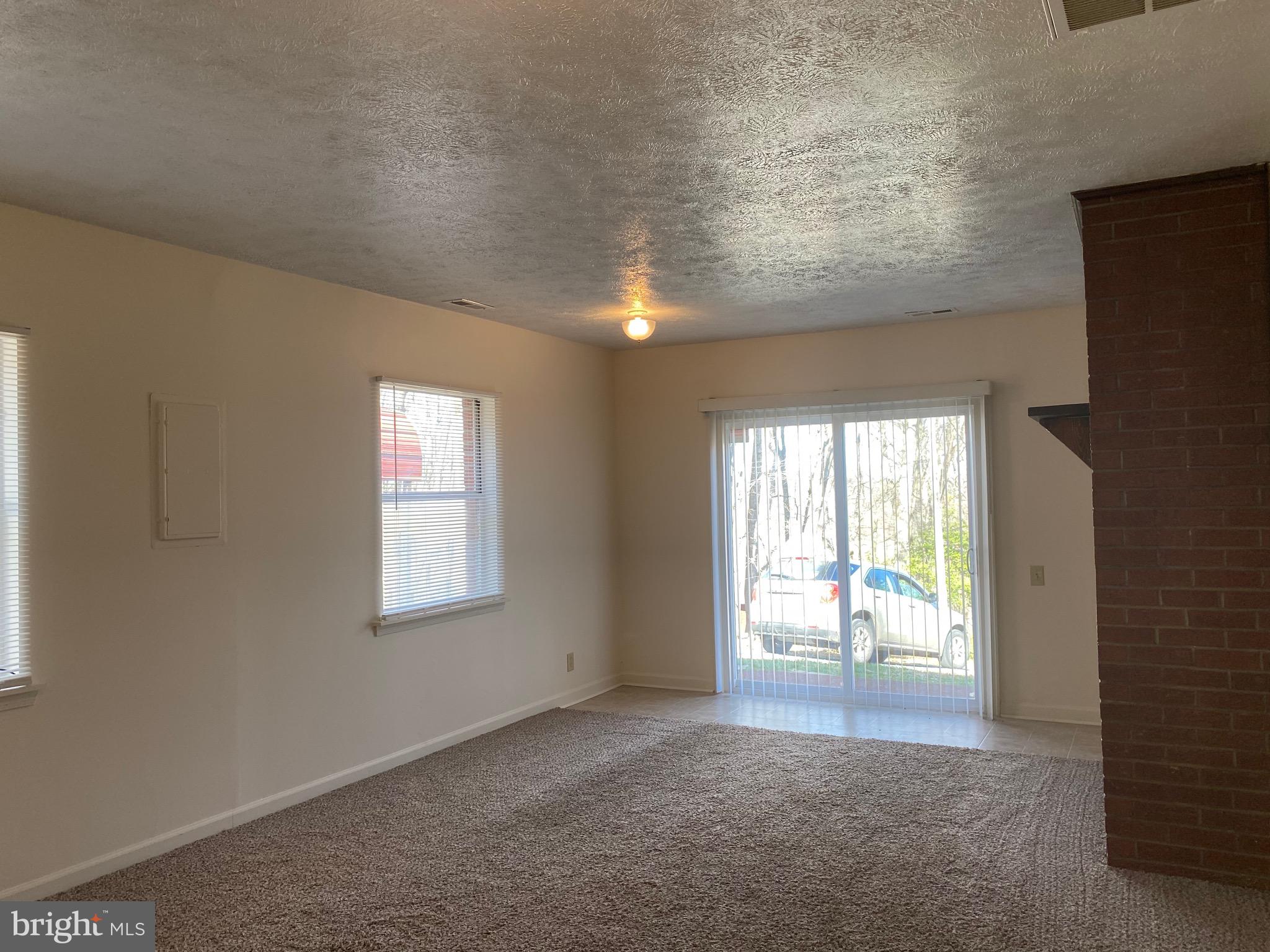 41 Comptons Road Castleton, VA 22716 - Photo 5 of 35 Room has plenty of sunlight and access to kitchen.
