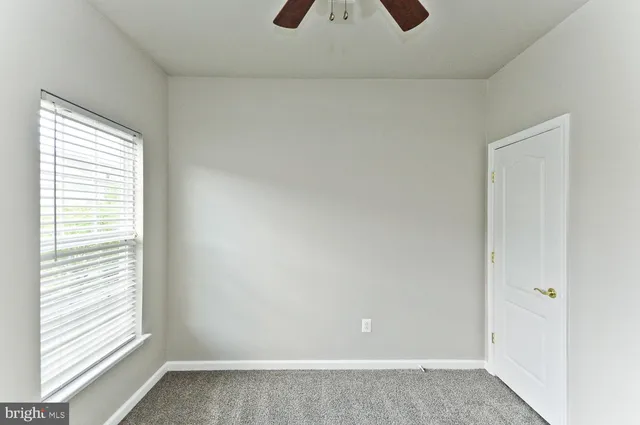 a view of a livingroom with a window
