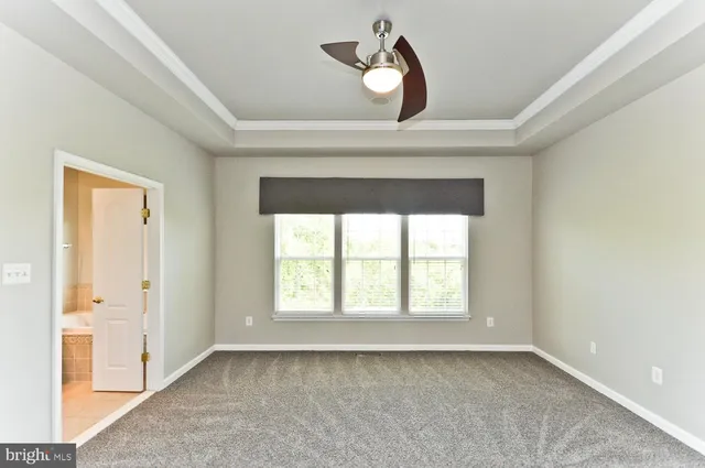 an empty room that has a window