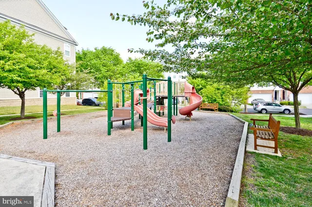 a view of a house with backyard porch and sitting area