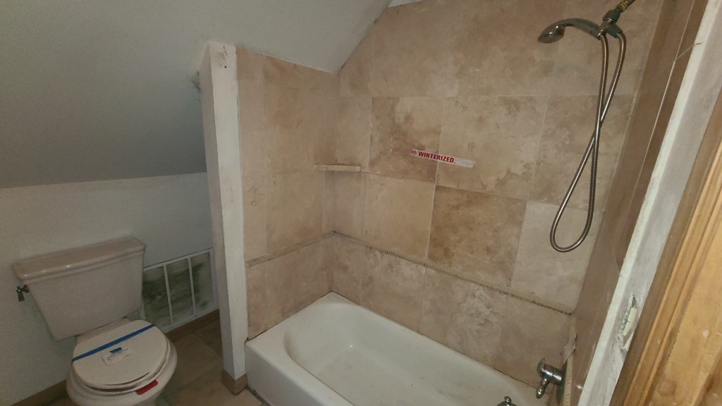 1442 Main Road Granville, MA 01034 - Photo 21 of 27 a bathroom with a toilet and a shower