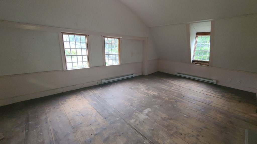 1442 Main Road Granville, MA 01034 - Photo 23 of 27 an empty room with a window