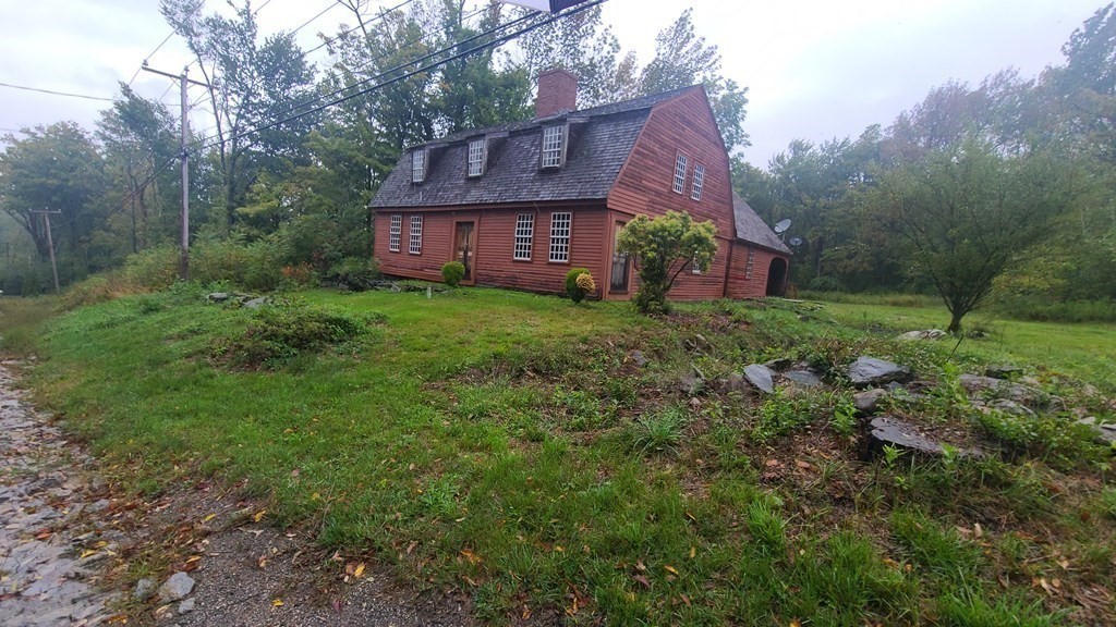 1442 Main Road Granville, MA 01034 - Photo 3 of 27 a view of a house with a yard