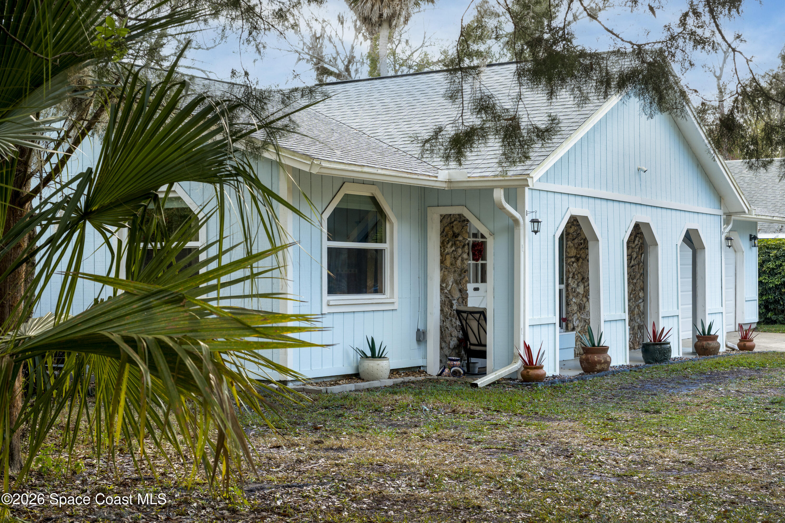686 Hand Avenue Ormond Beach, FL 32174 - Photo 1 of 29 a view of a house with a yard