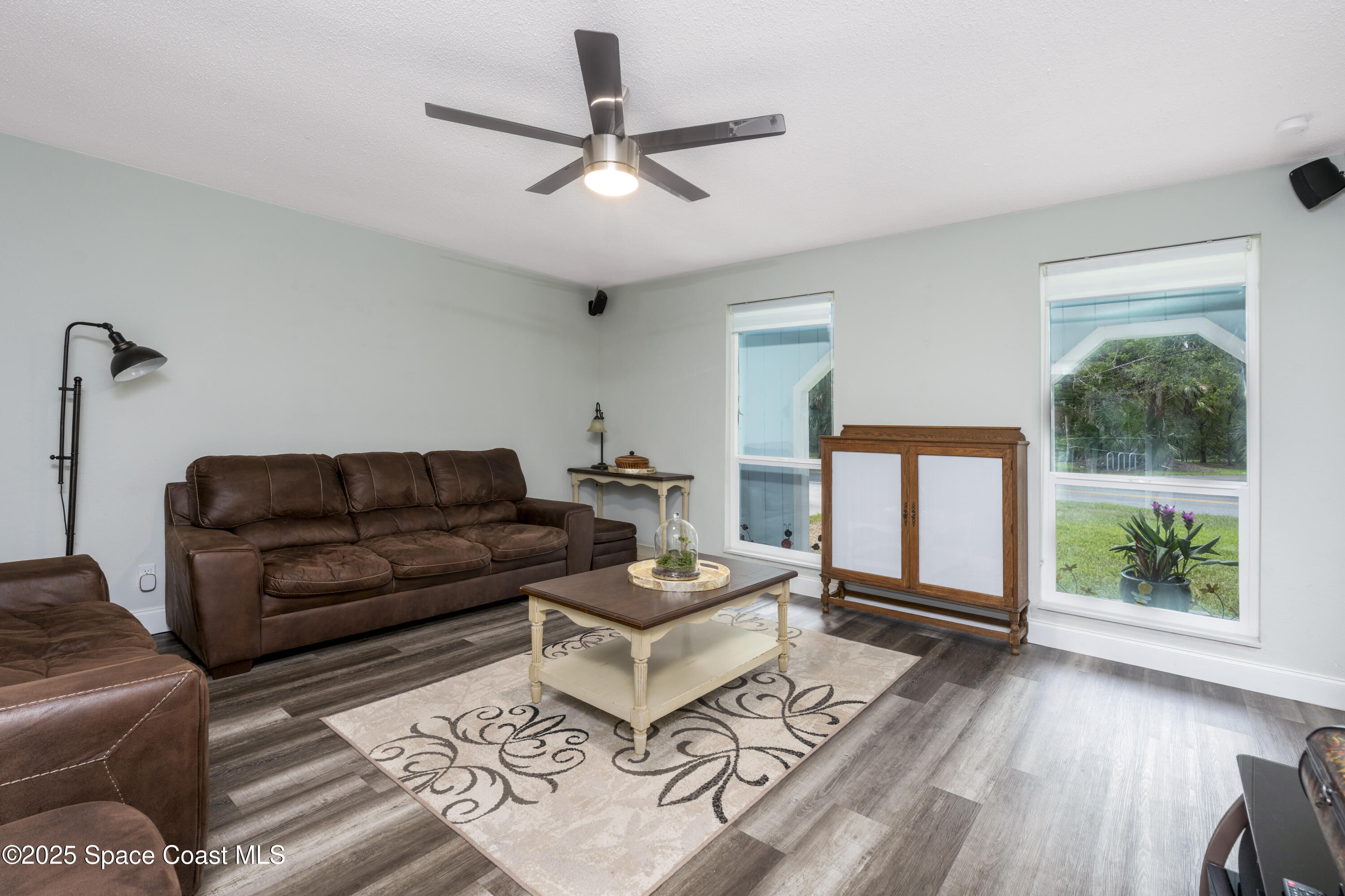 686 Hand Avenue Ormond Beach, FL 32174 - Photo 5 of 29 a living room with furniture and a large window