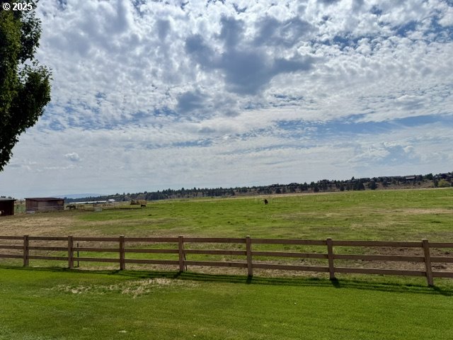 Southwest Mecate Lane, Unit TL330 Powell Butte, OR 97753 - Photo 5 of 10 a view of a lake with outdoor space