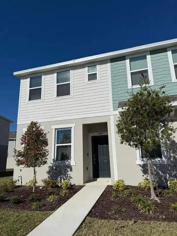 a view of house with garden