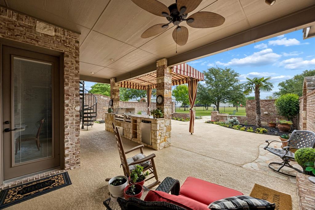 2930 Falcon Way Midlothian, TX 76065 - Photo 36 of 40 a building outdoor space with patio furniture and potted plants