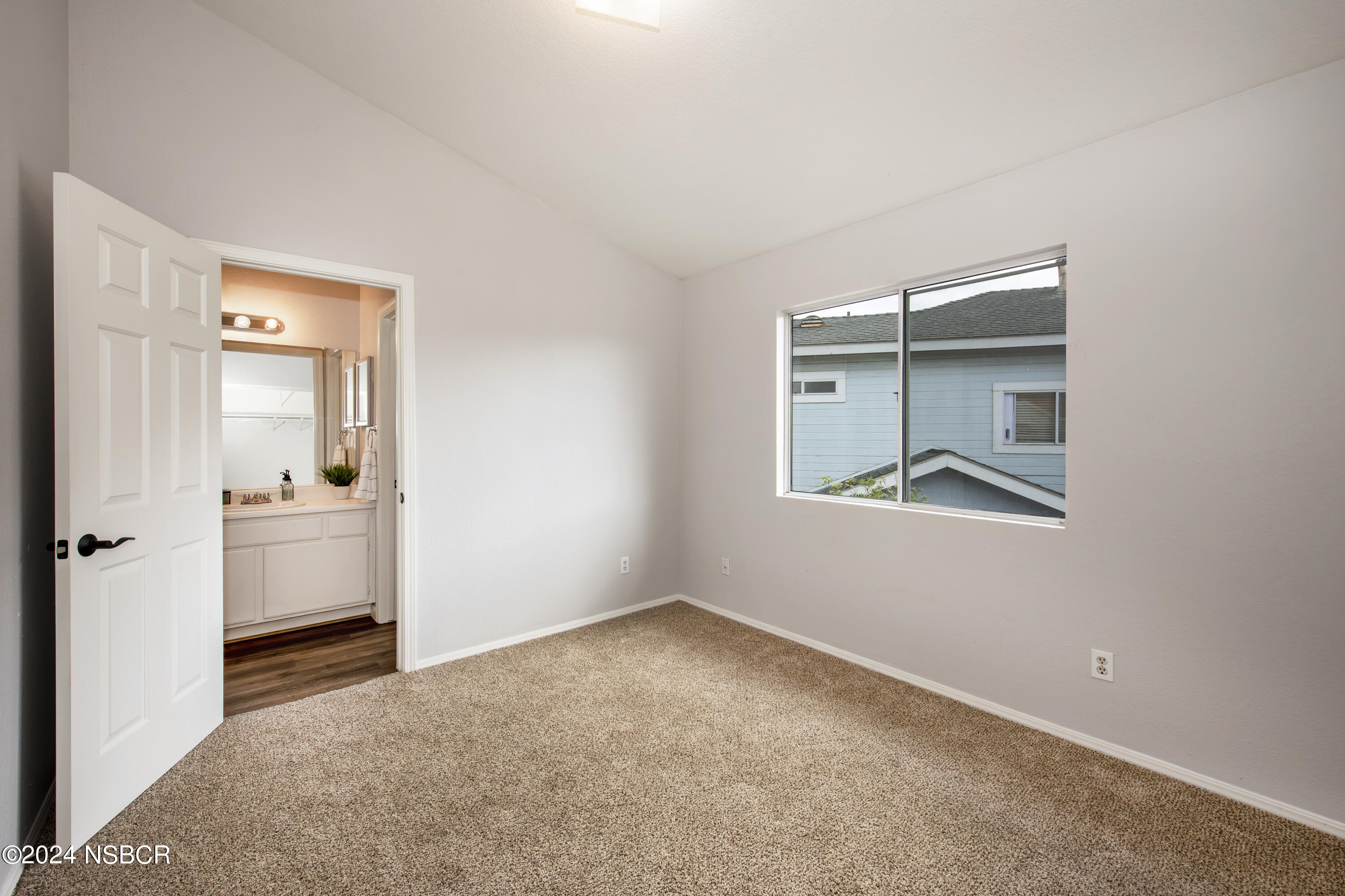 1341 Lloyd Place Lompoc, CA 93436 - Photo 17 of 20 an empty room that has a wooden cupboard