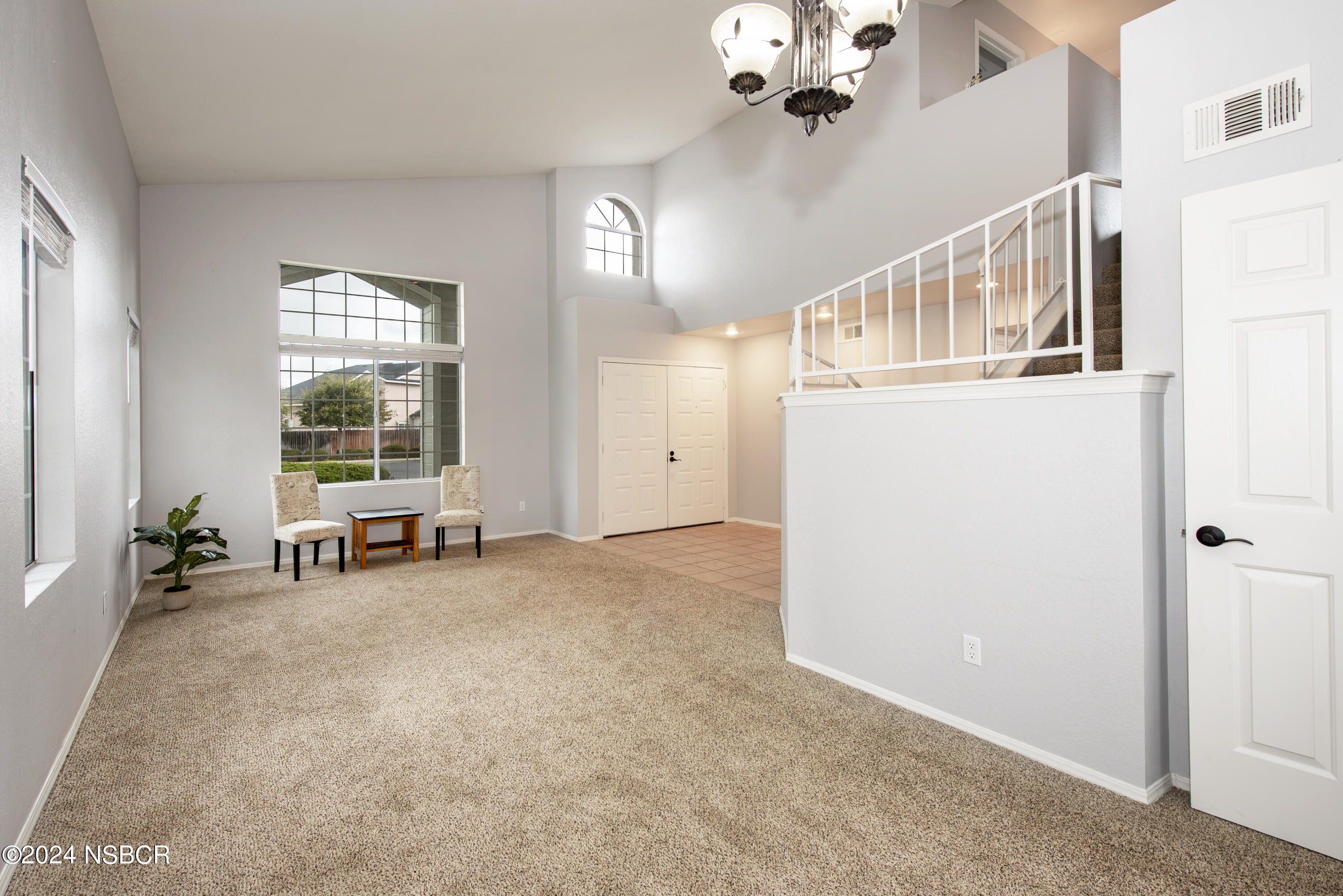 1341 Lloyd Place Lompoc, CA 93436 - Photo 4 of 20 wooden floor in an empty room with a window