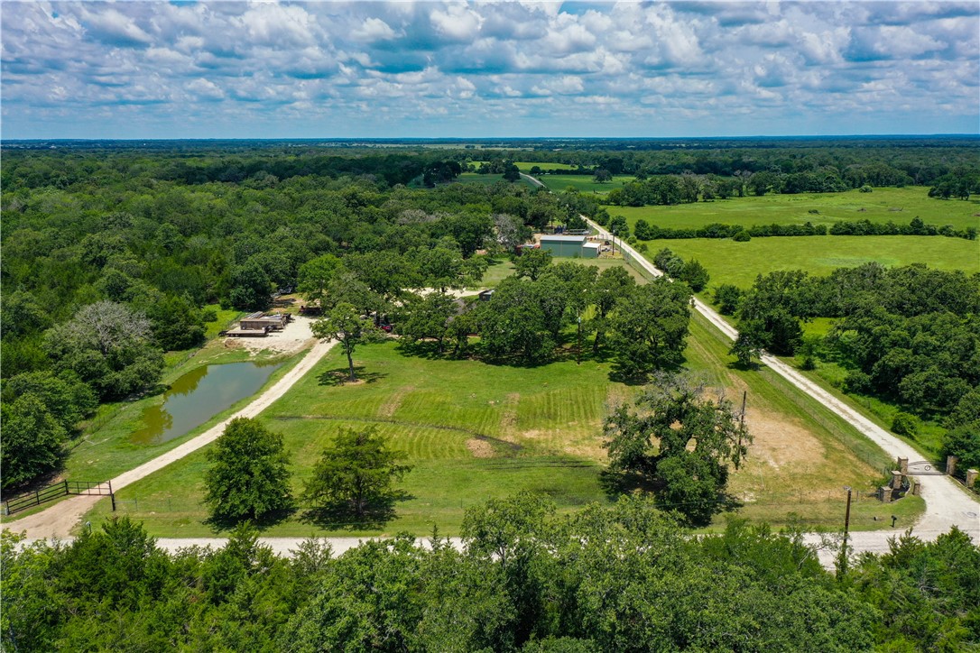 10285 Ferrill Creek Road Bryan, TX 77808 - Photo 40 of 49 an aerial view of residential houses with outdoor space and trees