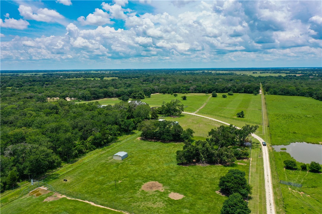 10285 Ferrill Creek Road Bryan, TX 77808 - Photo 41 of 49 a view of a golf course with a lake