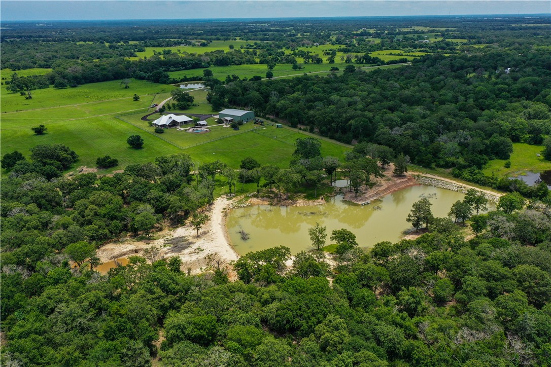 10285 Ferrill Creek Road Bryan, TX 77808 - Photo 45 of 49 an aerial view of residential houses with outdoor space and trees